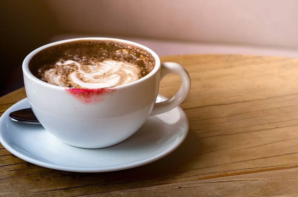 The Lipstick-Stained Cup